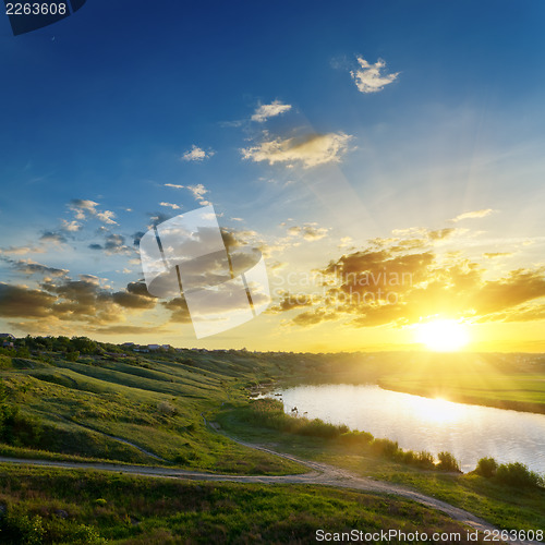 Image of dramatic sunset over river