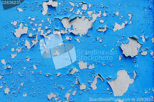 Image of cracked blue paint surface as grunge background