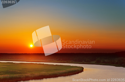 Image of red sunset over river