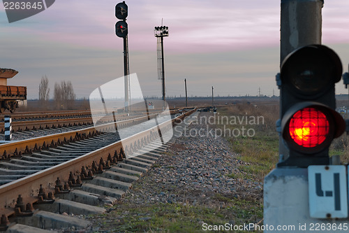 Image of railroad track and stop light