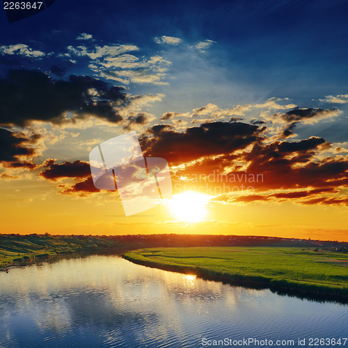 Image of dramatic sunset over river