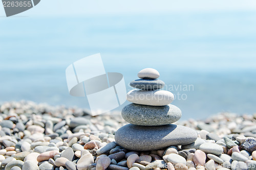 Image of stack of zen stones on beach