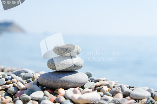 Image of stack of zen stones near sea