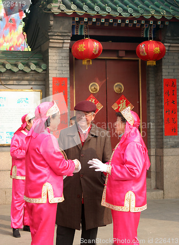 Image of Chinese New Year celebrations in Qingdao, China - performers cha