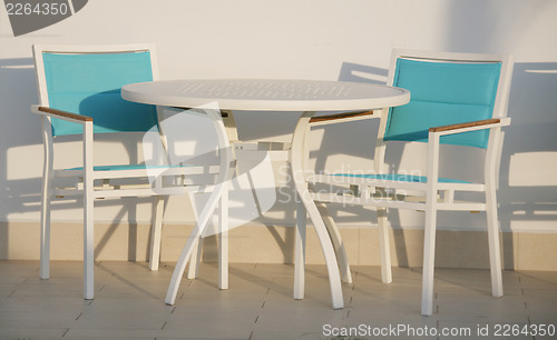 Image of Outdoor, modern furniture-table and chairs. 