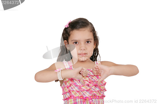 Image of Pretty little girl hand gesturing thumb down failure sign 