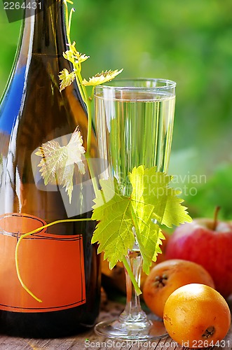 Image of Champagne  glass and fruits