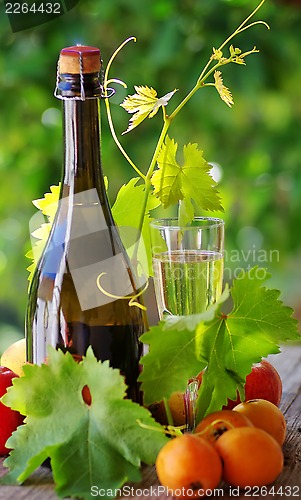 Image of Champagne  glass and fruits