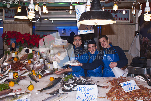 Image of men selling fish