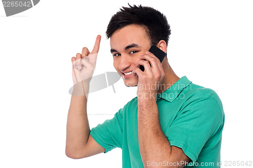 Image of Cheerful young boy communicating