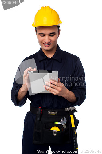 Image of Field worker accessing touch pad