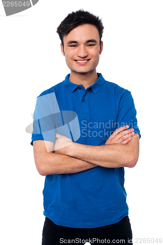 Image of Smiling smart guy posing with confidence