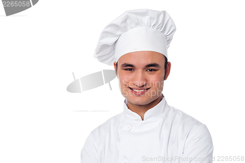 Image of Young smiling confident male chef