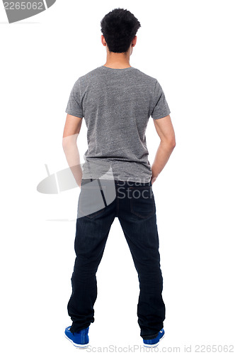 Image of Rear view of a man in casuals, full length shot