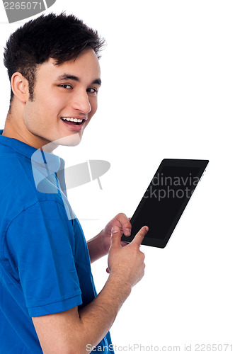 Image of Smart guy holding touch pad