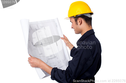 Image of Construction worker reviewing plan