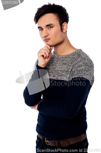 Image of Young guy thinking of something