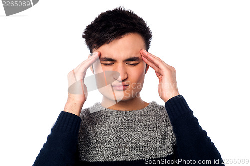 Image of Young guy having headache