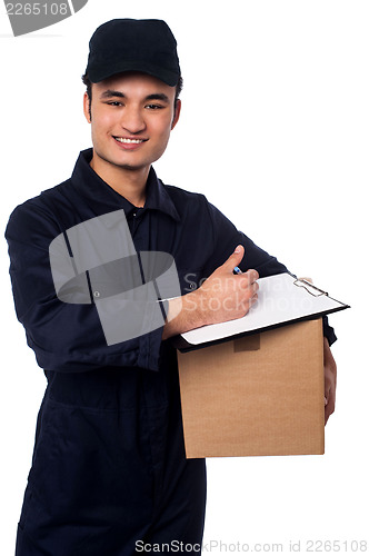 Image of Smiling delivery man at your doorstep