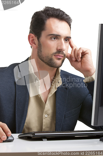 Image of Man Looking At A Computer Monitor
