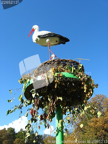 Image of people made artifisial nest of storks