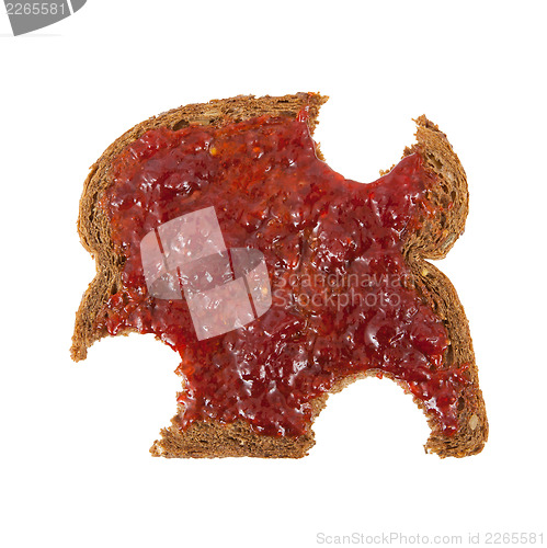 Image of Slice of brown bread with jam 