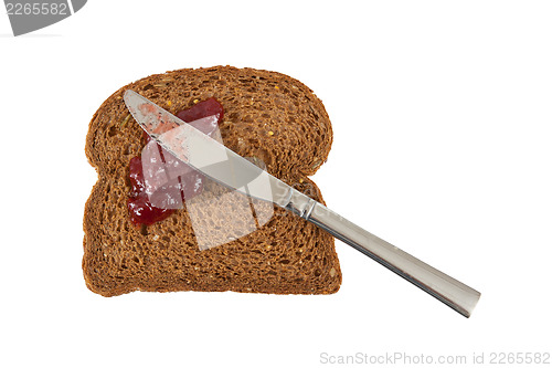 Image of Slice of brown bread with jam 