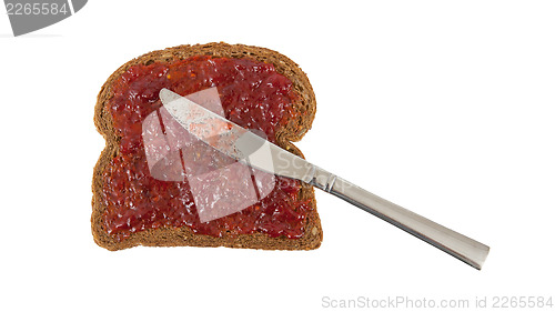 Image of Slice of brown bread with jam 