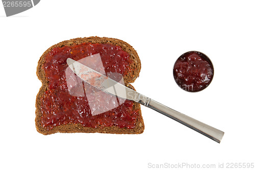 Image of Slice of brown bread with jam 