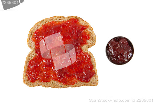 Image of Slice of brown bread with jam 