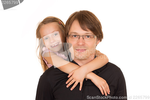 Image of Father giving piggyback ride