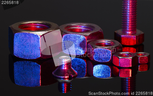 Image of illuminated screw and screw nuts