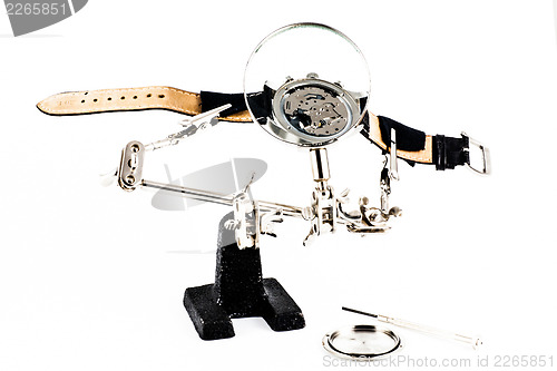 Image of Watch repairing operation