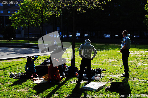 Image of Roma people and police