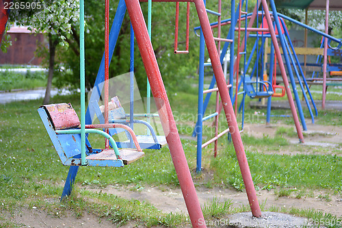 Image of children's swing in a yard