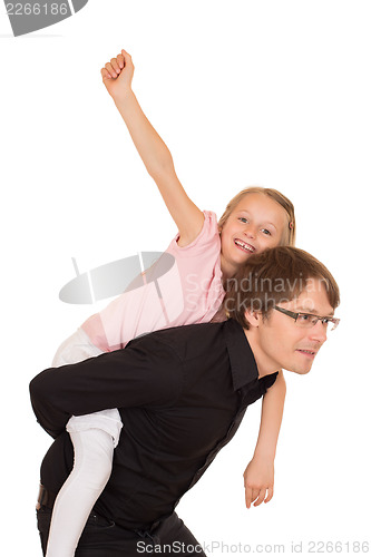 Image of Father giving piggyback ride to his daughter