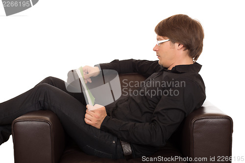 Image of Man reading a book