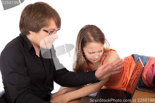 Image of Dad hides laptop to his daughter