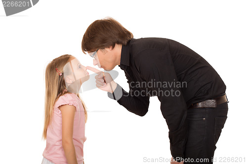 Image of Despairing father pointing finger at his daughter