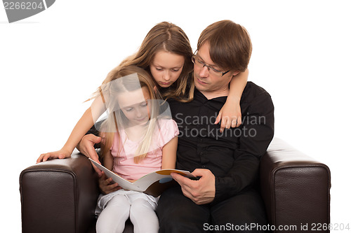 Image of Family reading a story