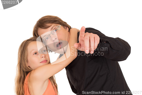 Image of Father showing something to his daughter