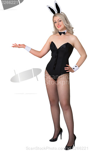 Image of Girl dressed as a rabbit shows something