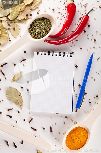 Image of notebook and pen to write recipes