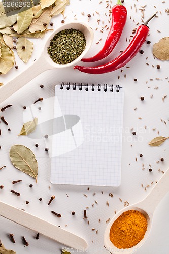Image of Spices, notebook, red chili pepper