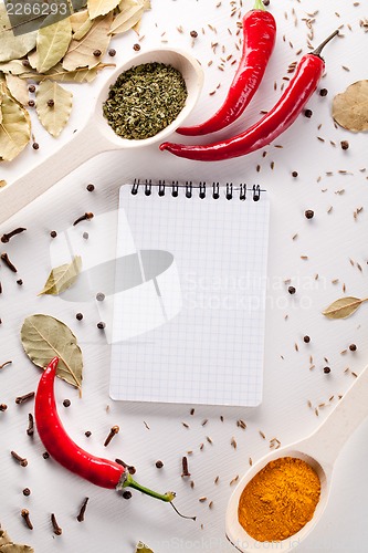 Image of Spices, notebook, red chili pepper
