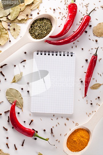 Image of Spices, notebook, red chili pepper