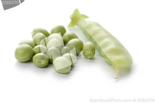 Image of Ripe pea vegetable with green leaf isolated on white background