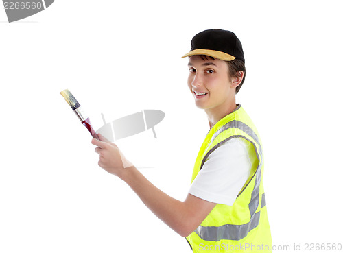 Image of Smiling painter with paint brush