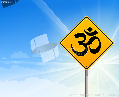 Image of Om Yoga sign and blue sky