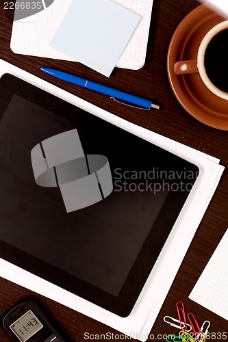 Image of Workplace with blank digital tablet
